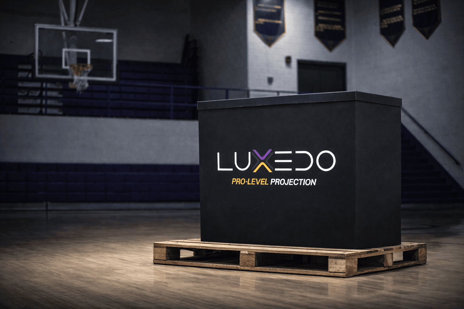 Luxedo court projection system arriving on-site at a school gym